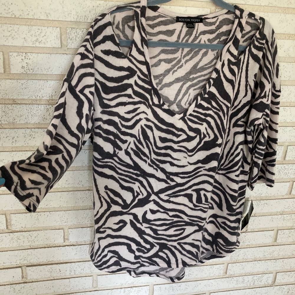 Open shoulder sweater